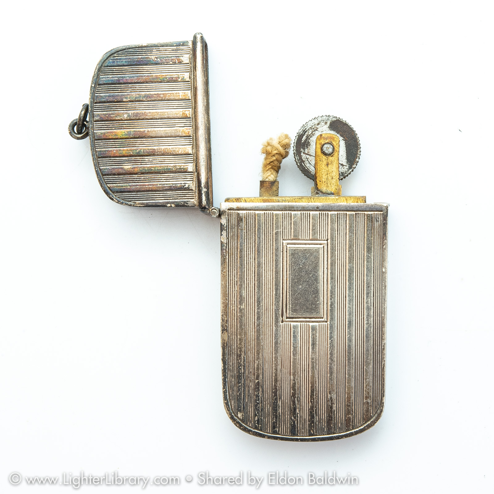 M.E. Bernhardt Co. Inc. sterling silver pocket lighters